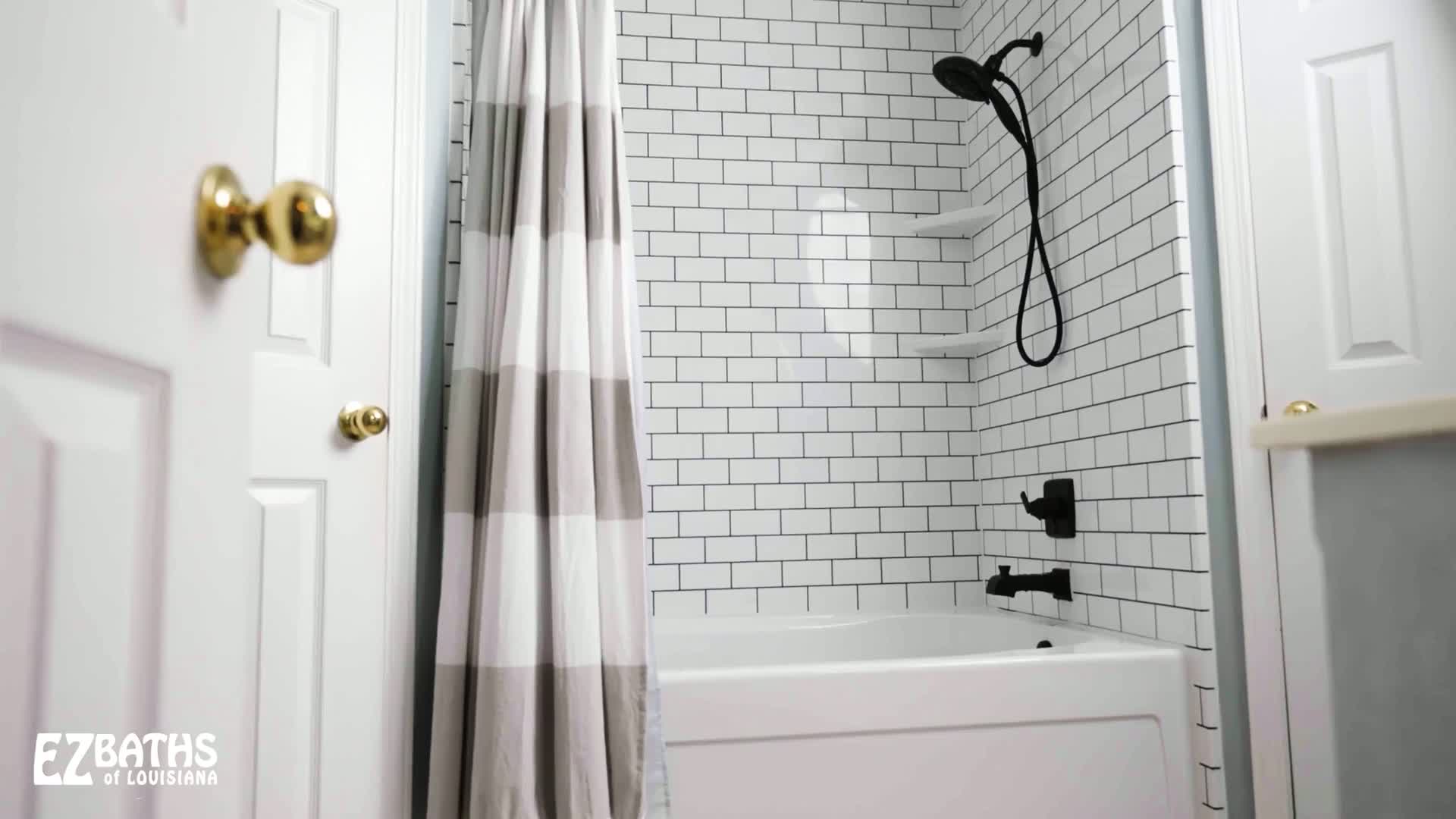 EZ Baths finished shower with subway tile and matte black fixtures